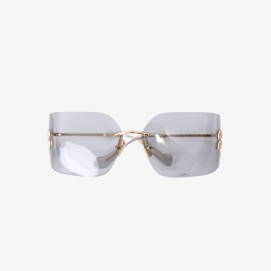 Miu Miu 54YS Rimless Sunglasses in Dark Grey with Gold-Tone Hardware