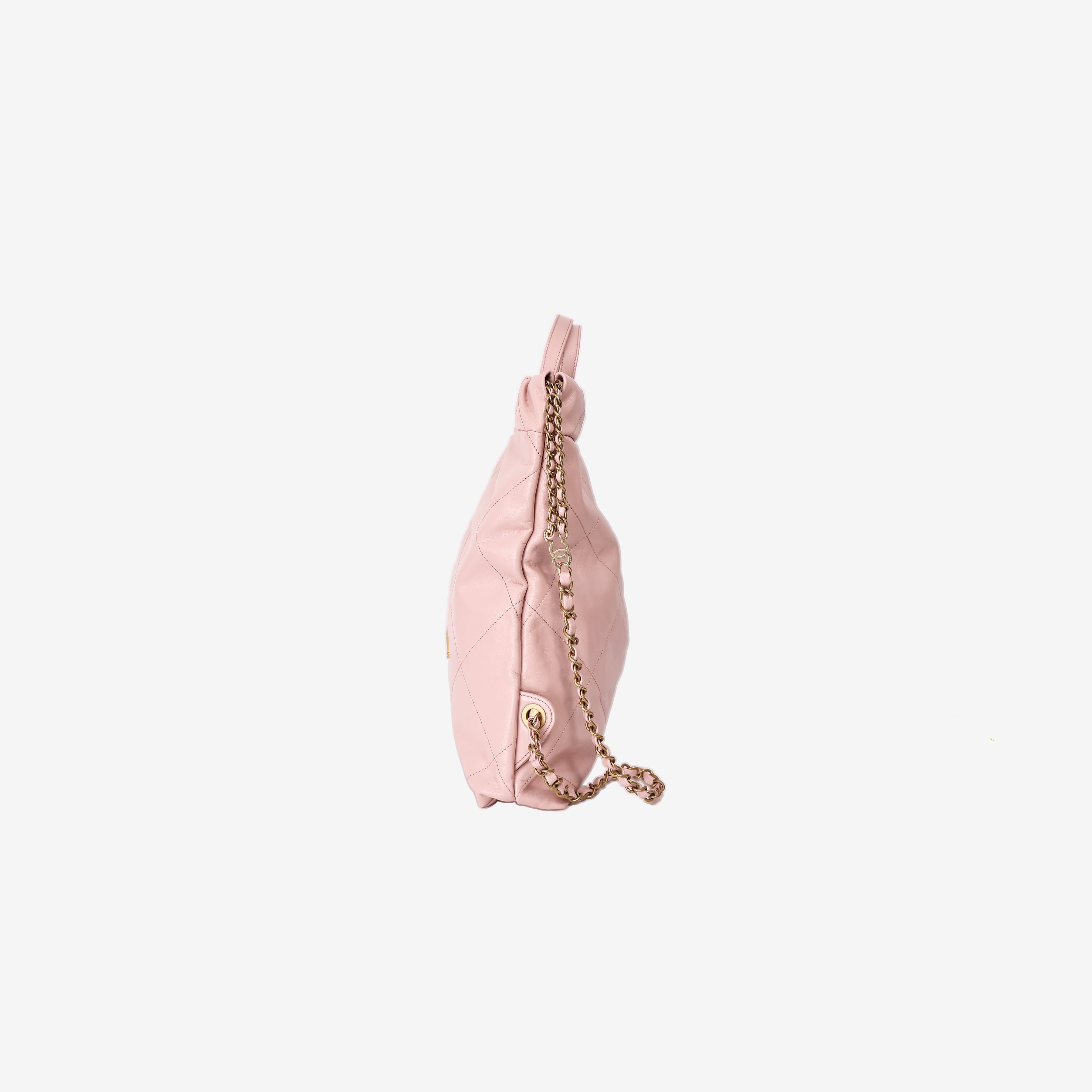 Chanel 22 Backpack in Pink Calfskin Leather with Gold Hardware side view