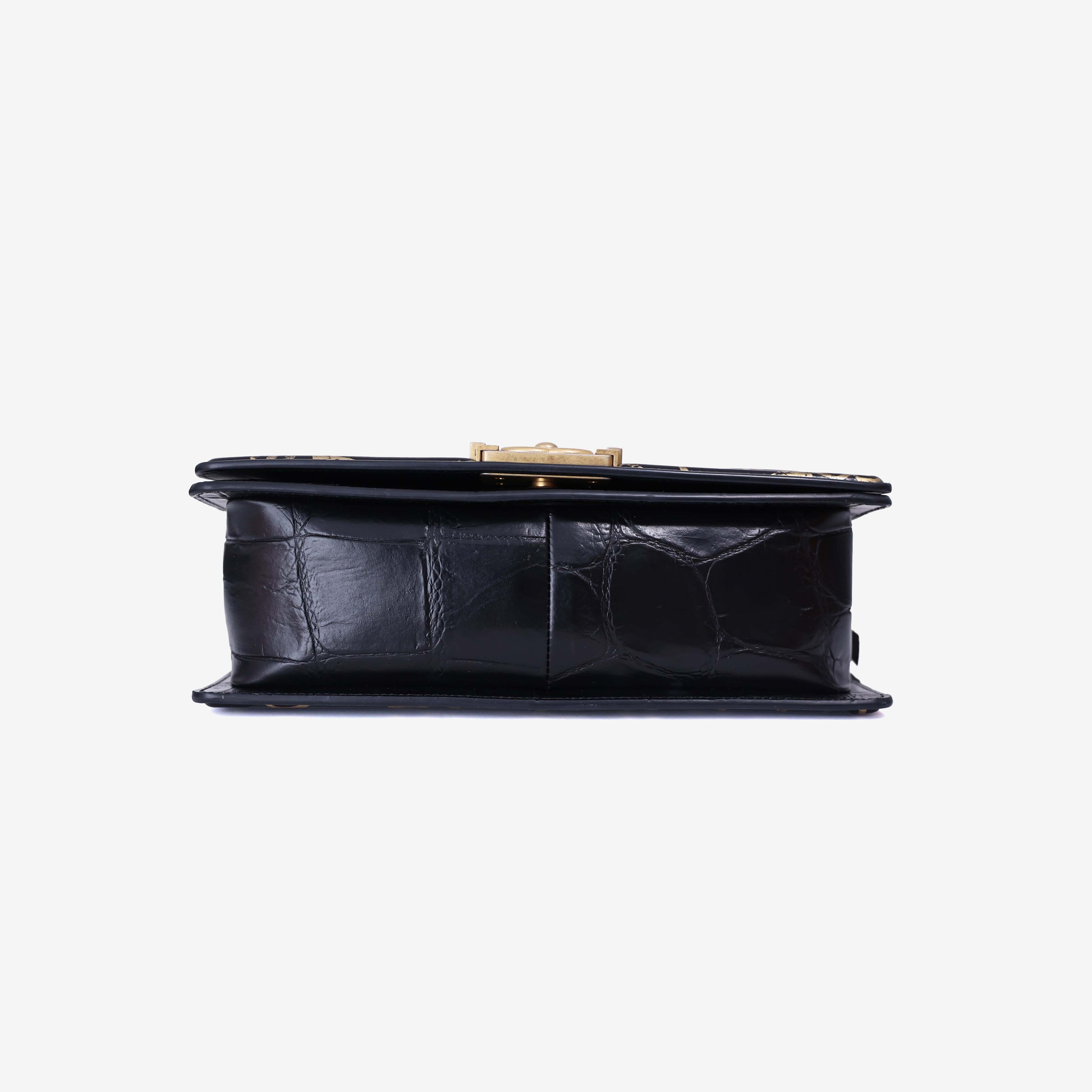 Chanel Medium Boy Flap Bag in Black Embossed Calfskin Leather with Gold Hardware bottom view