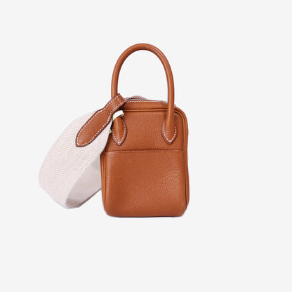 Hermès Mini Lindy in Gold Barenia Leather with Palladium Hardware side view