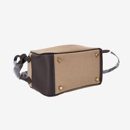 Hermès Mini Lindy Cargo in Ecru Toile Canvas and Ébène Swift Leather with Gold Hardware bottom side view