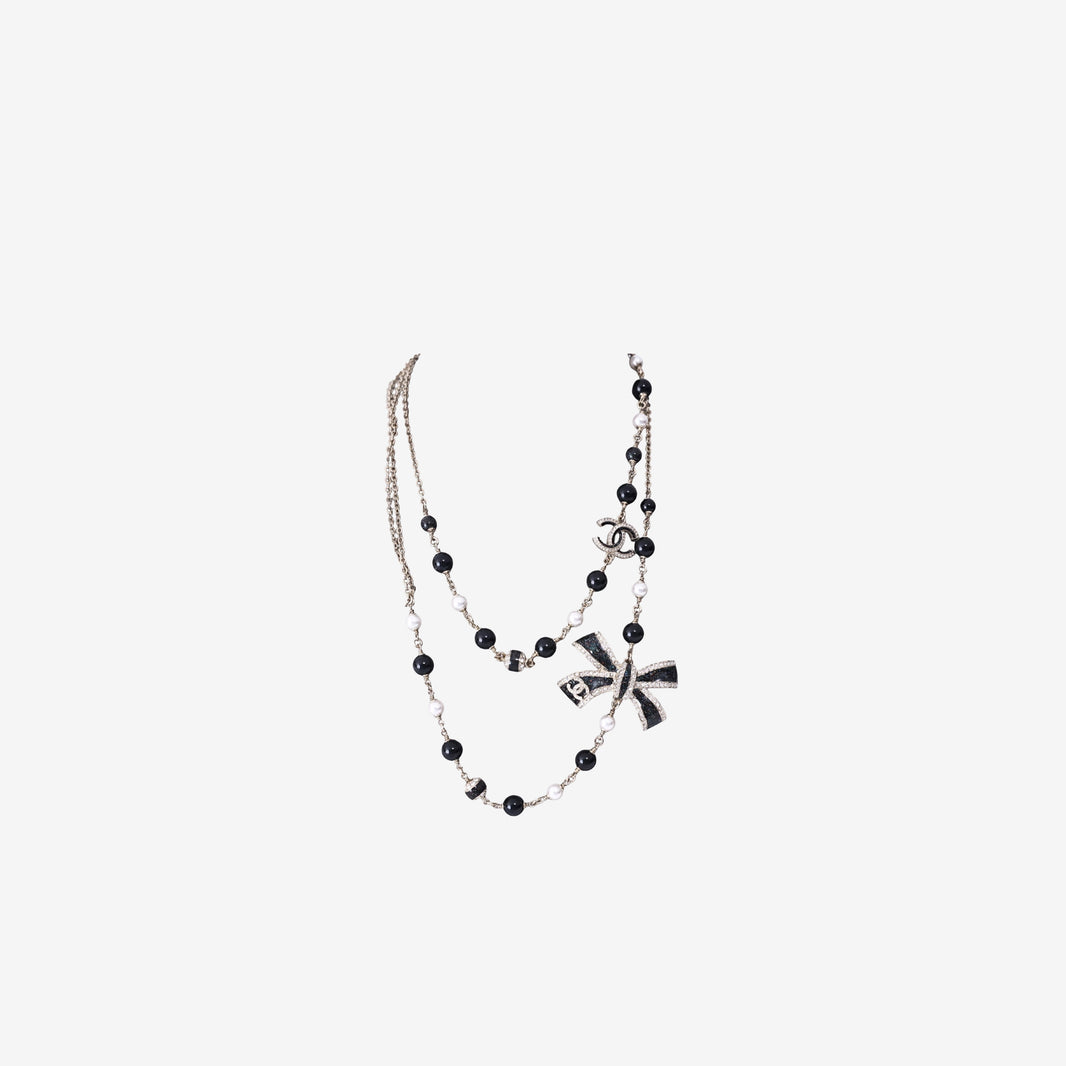 Chanel Long Sautoir Necklace in Black & White Beads with Crystal Bow, Faux Pearls & Gold-Tone Hardware