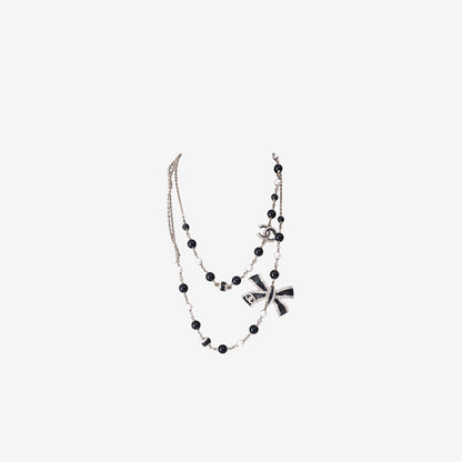 Chanel Long Sautoir Necklace in Black & White Beads with Crystal Bow, Faux Pearls & Gold-Tone Hardware