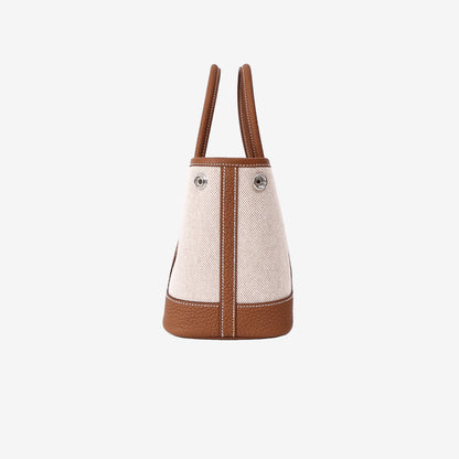 Hermès Neo Garden Party 23 Mini in Ecru, Beige and Ébène Negonda Leather and Canvas side view