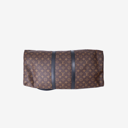 Louis Vuitton Keepall Bandoulière 55 in Monogram Macassar Coated Canvas with Black Leather and Silver Hardware