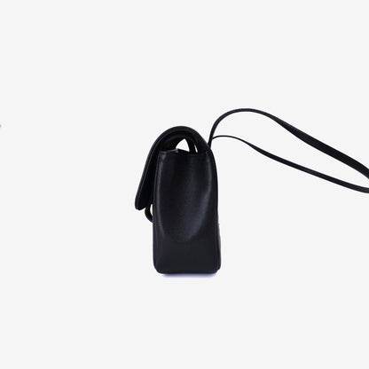Chanel 26P Small Flap Bag in Black Calfskin with Gold Hardware side view