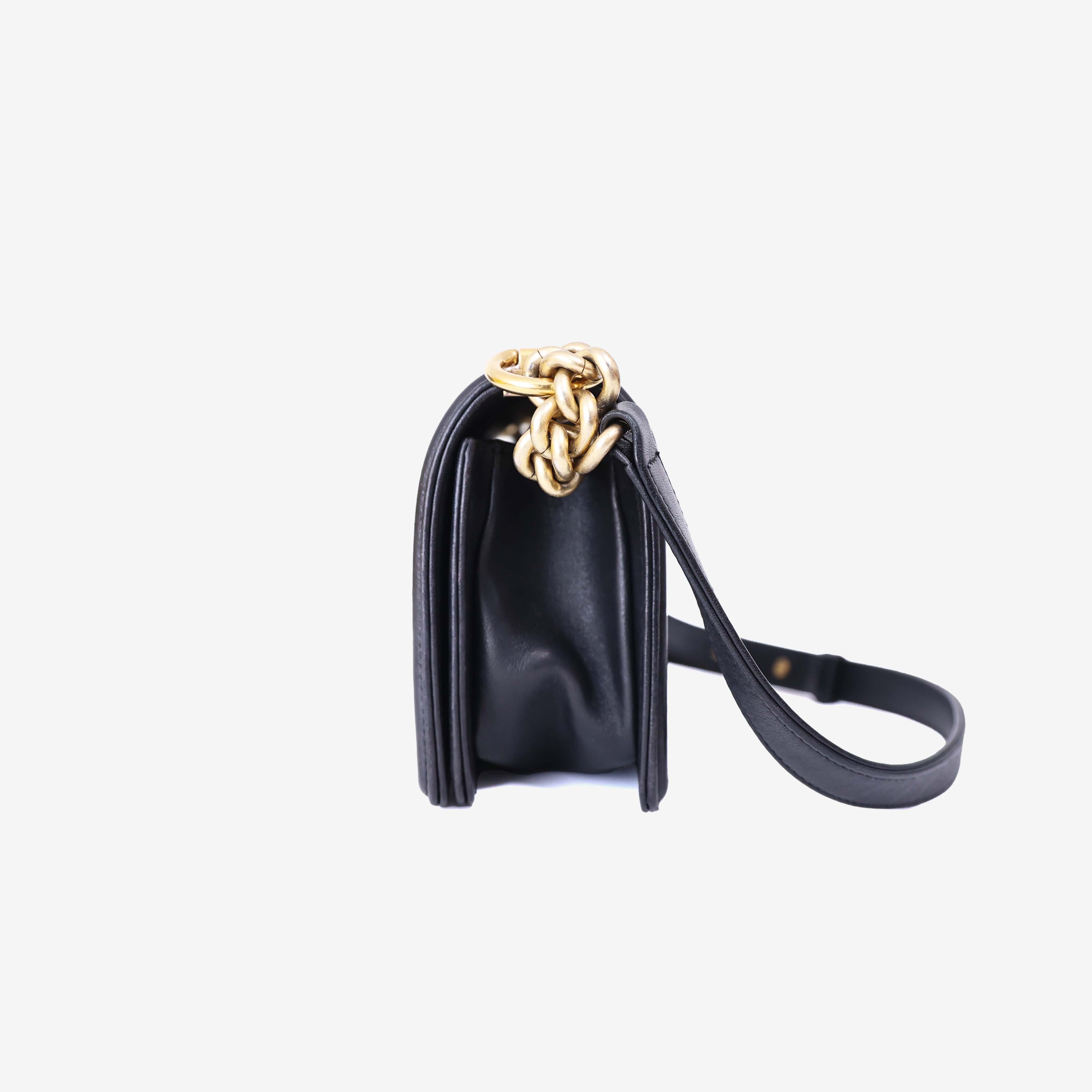Chanel Boy Bag in Black Lambskin Leather with Gold Hardware side view
