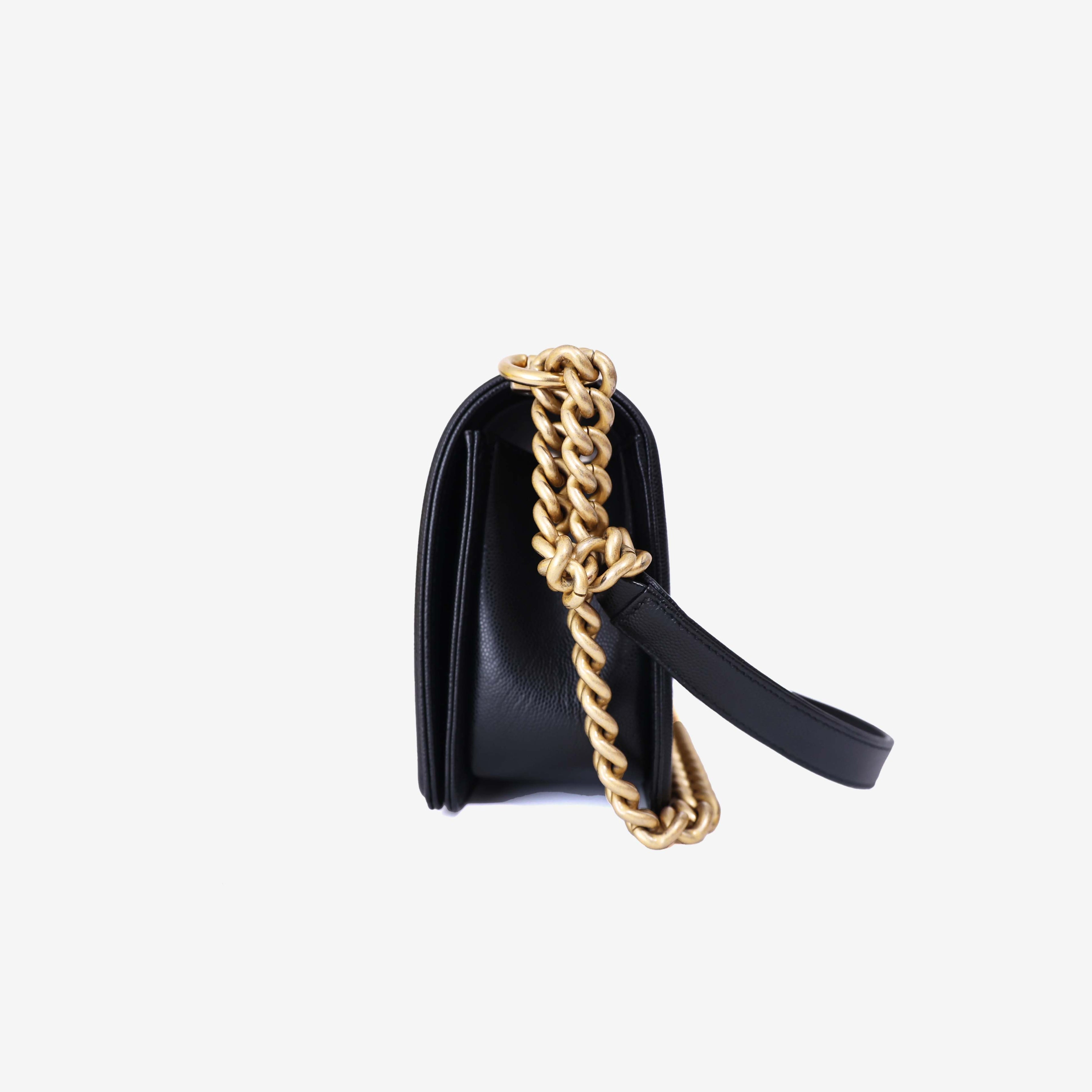 Chanel Boy Bag Medium in Black Caviar Leather with Gold Hardware side view
