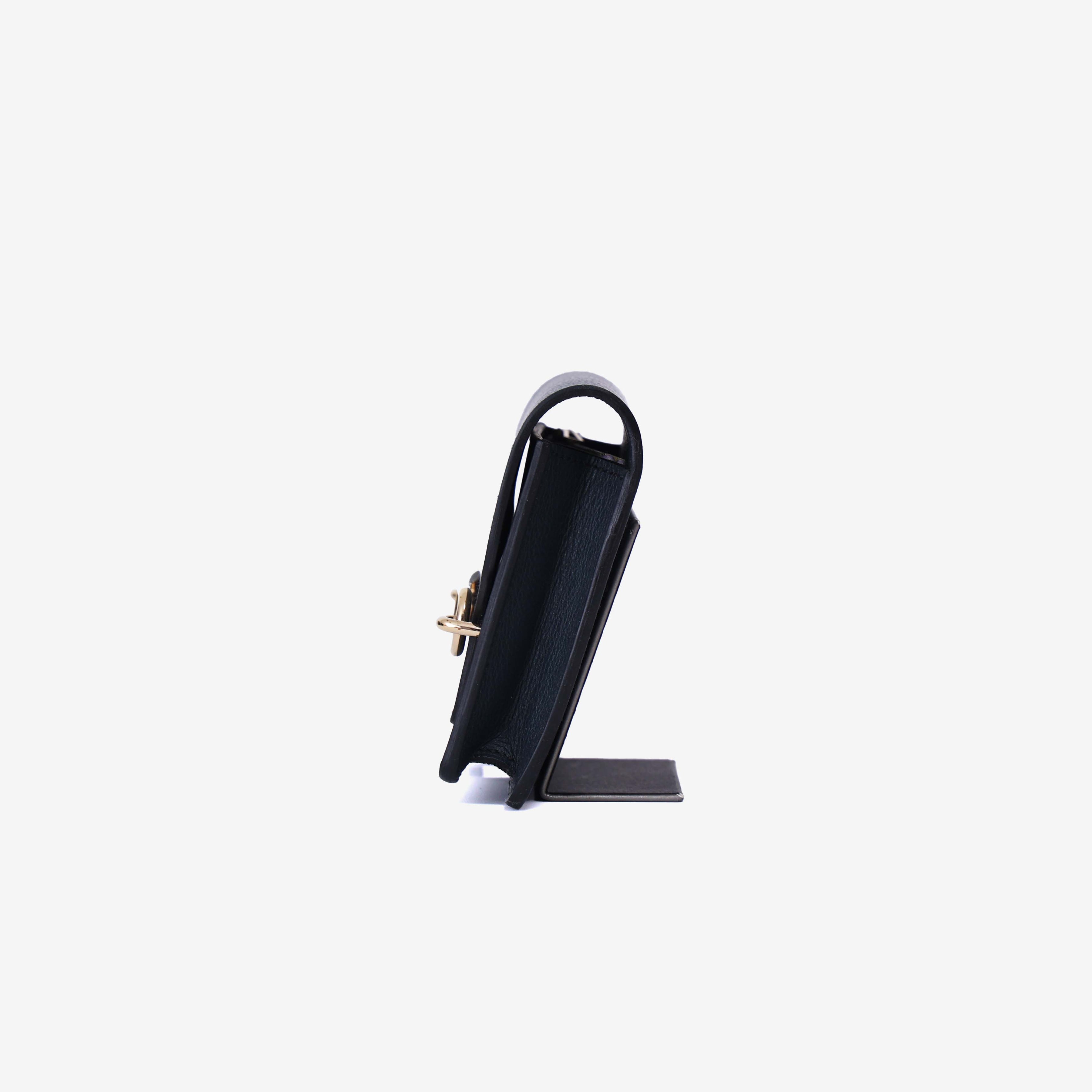 Hermès Roulis Wallet in Bleu Nuit Evercolor Leather with Gold Hardware side view