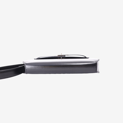 Hermès Kelly Dépêches 25 in Noir Barenia Leather with Palladium Hardware