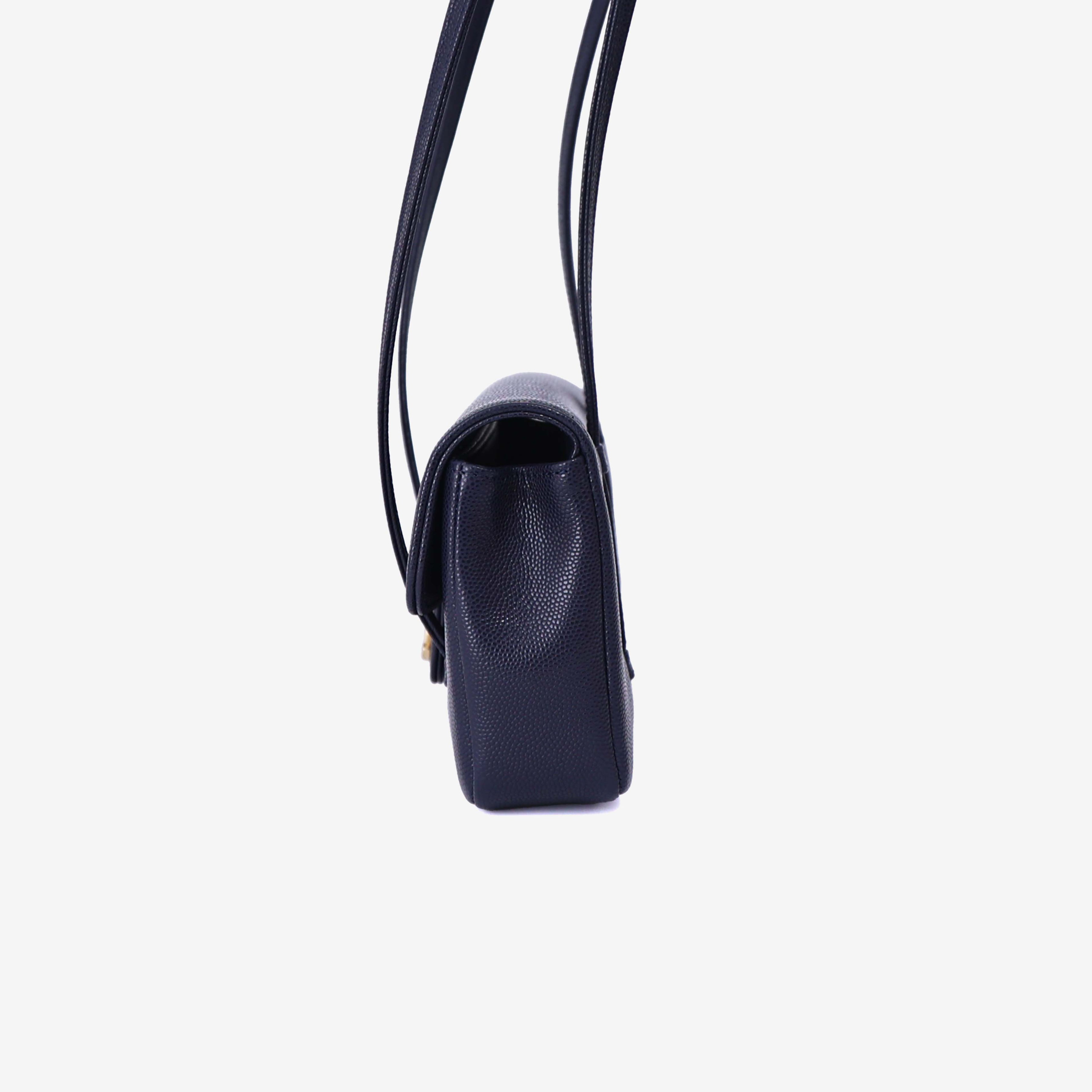 Chanel 26P Preppy Flap Mini in Navy Calfskin Leather with Gold Hardware side view