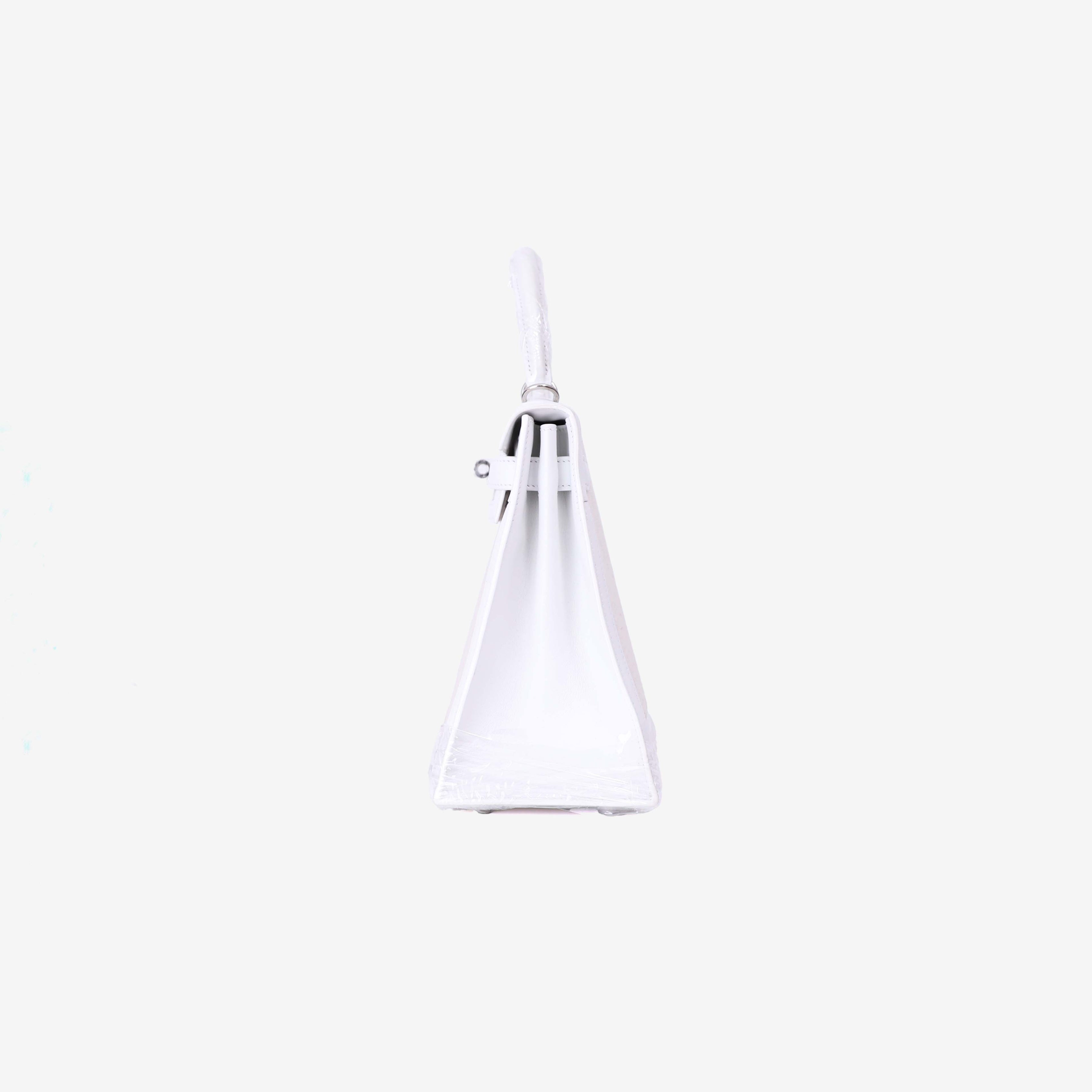 Hermès Kelly 28 in Blanc Canvas with Leather Trim with Palladium Hardware side view