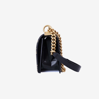Chanel Medium Boy Flap Bag in Black Embossed Calfskin Leather with Gold Hardware side view