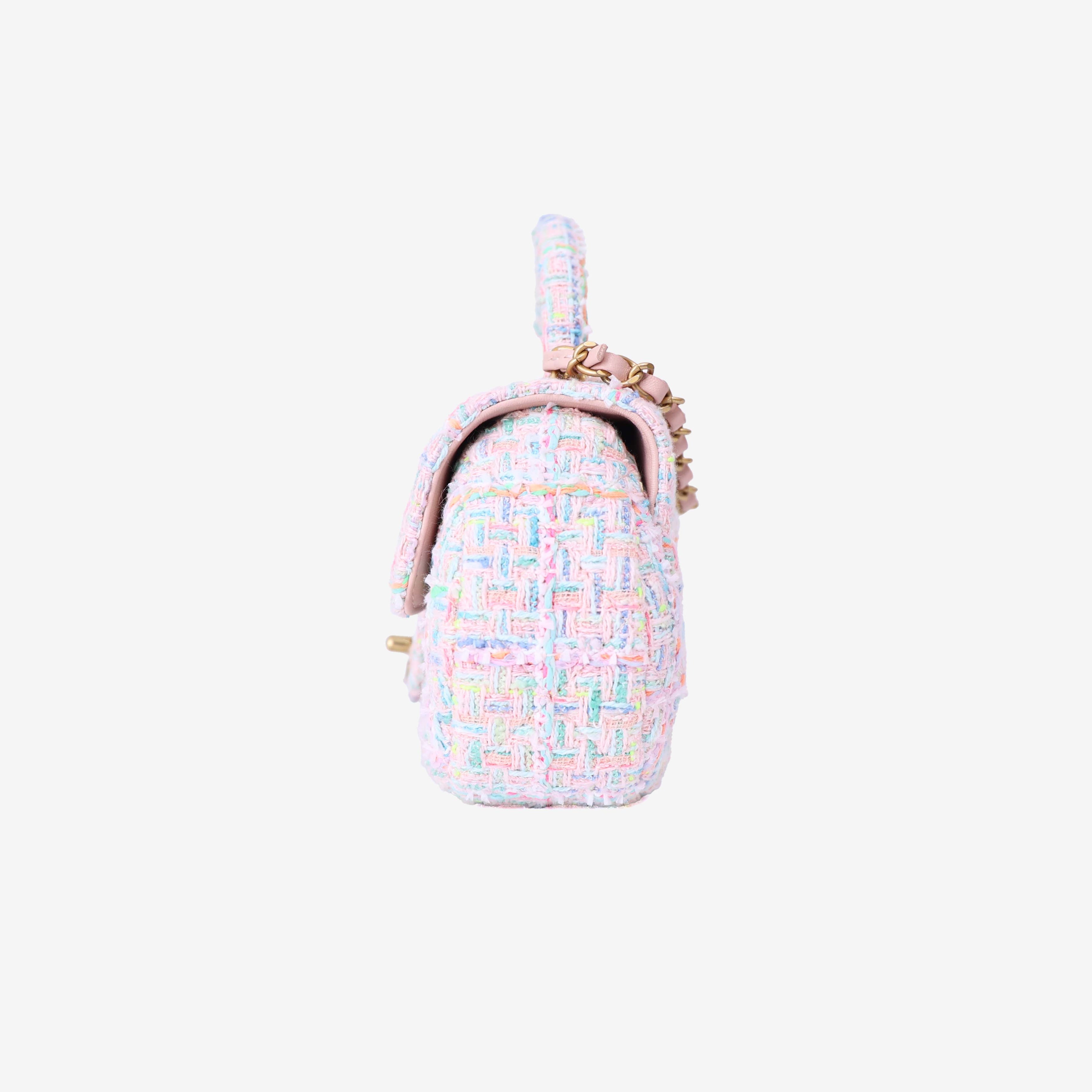 Chanel Mini Flap Bag with Top Handle in Pink Tweed Leather with Gold Hardware side view