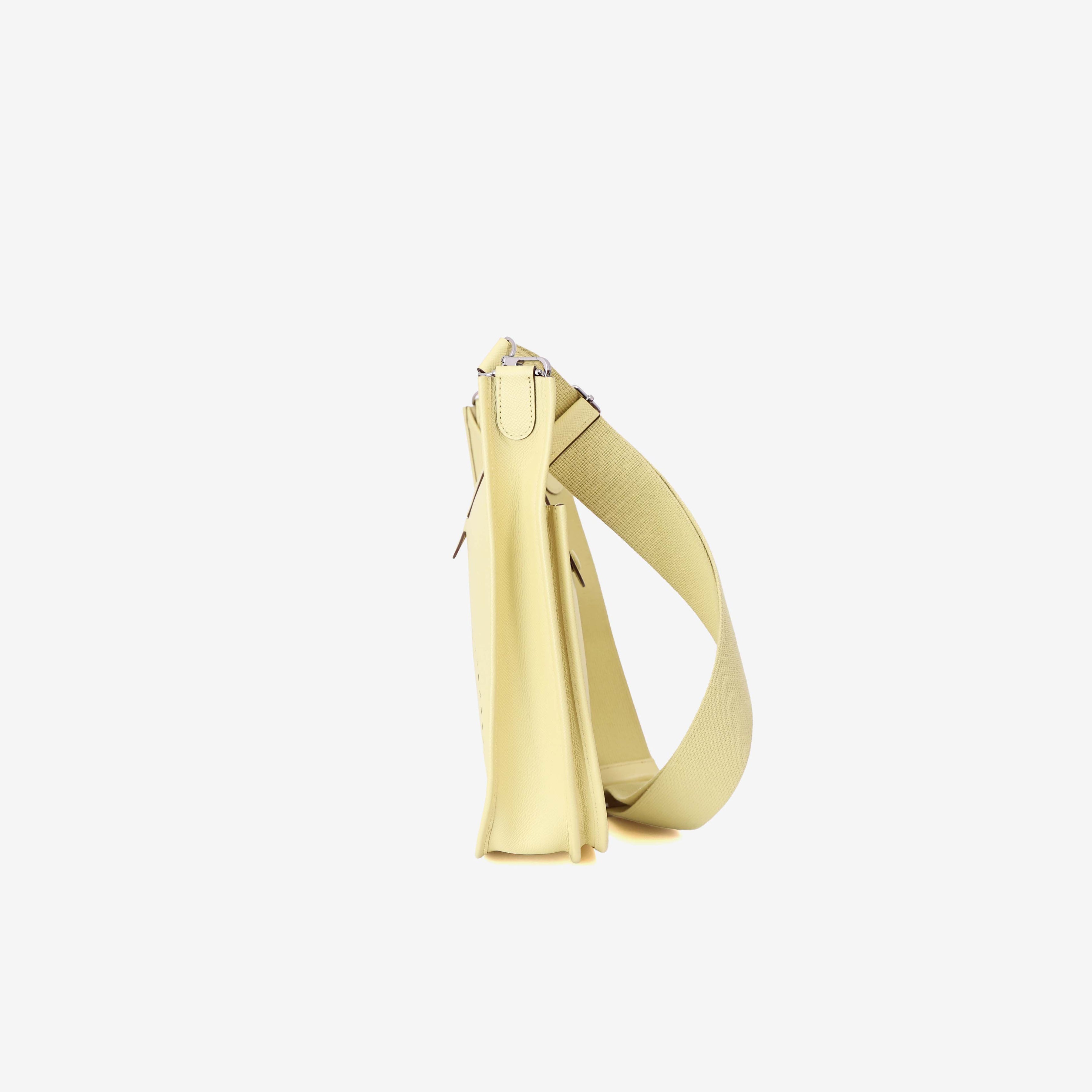 Hermès Evelyne 29 in Jaune Poussin Epsom Leather with Palladium Hardware side view