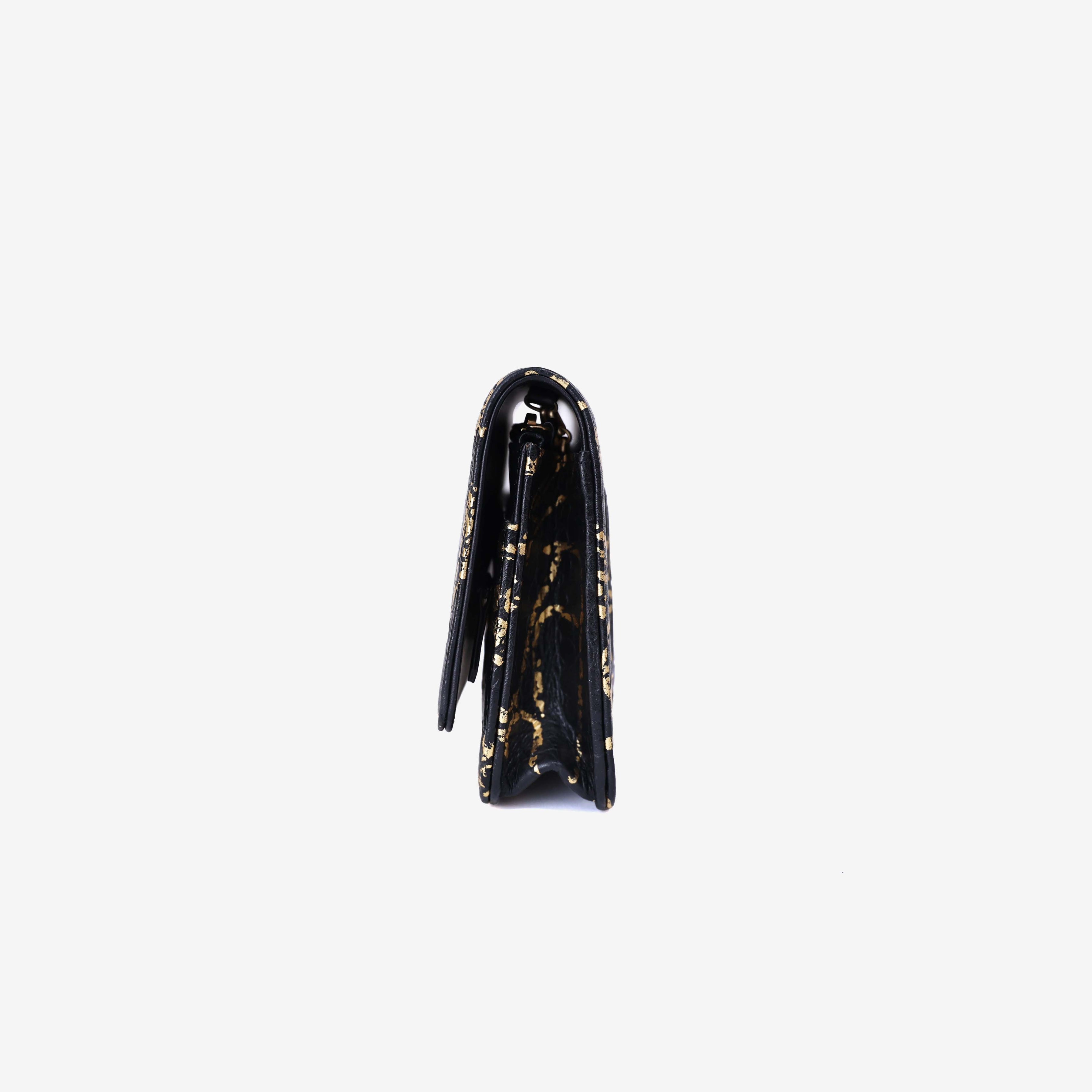 Chanel 2.55 Wallet on Chain in Black Calfskin Leather with Gold Hardware side view