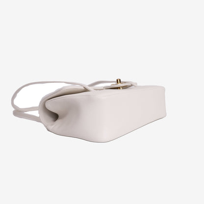 Chanel 26P Preppy Flap Bag Small in White Calfskin Leather with Gold Hardware bottom side view