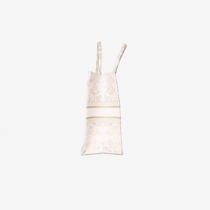 Dior Book Tote Medium in Latte Toile de Jouy Embroidered Cotton with Gold Detailing side view