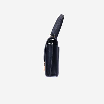 Hermès Constance 24 in Noir Ostrich Leather with Gold Hardware side view