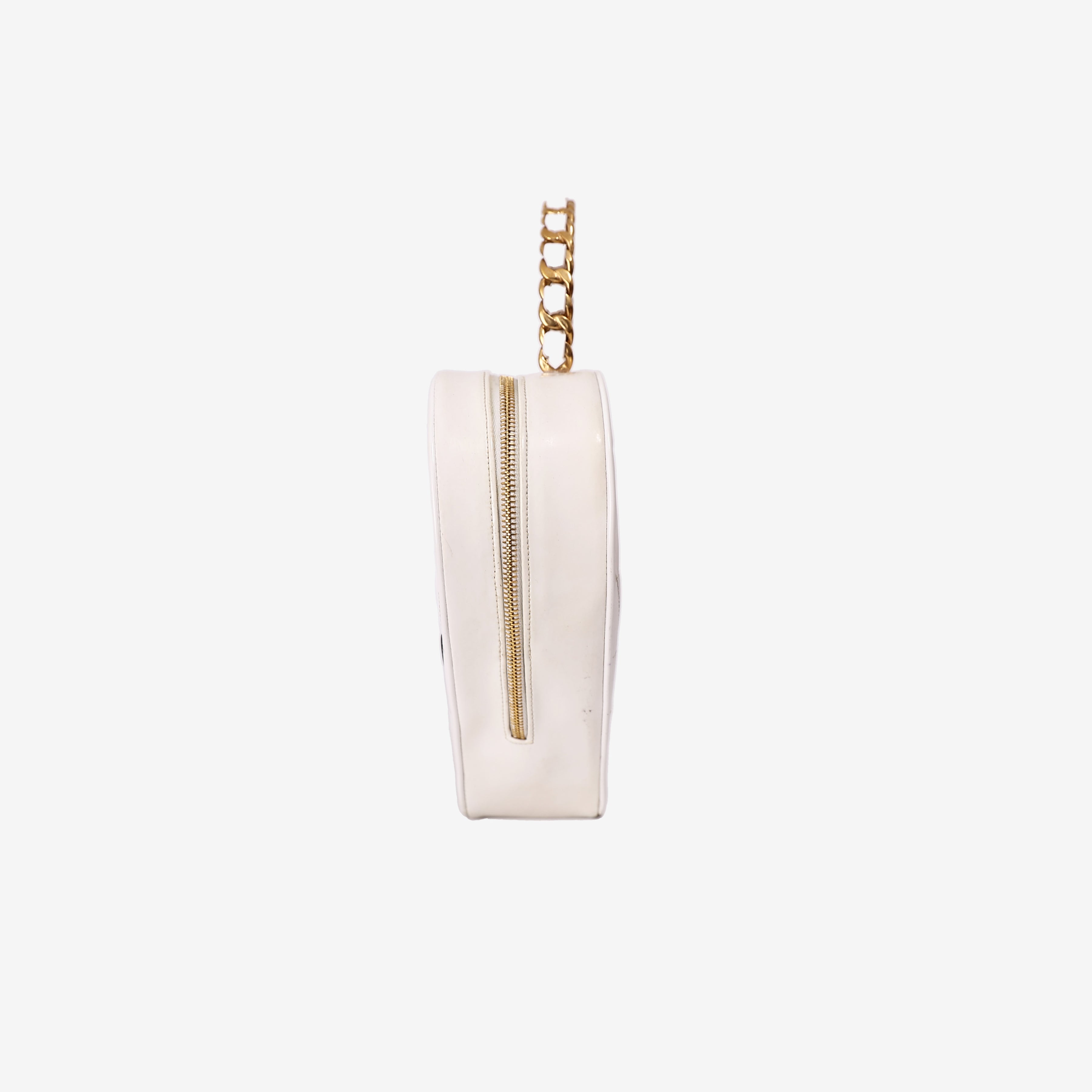 Chanel Vintage Heart-Shaped Vanity Bag in White Patent Leather with Gold Hardware side view