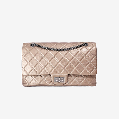 Chanel 2.55 Reissue Maxi Double Flap Bag in Metallic Champagne Lambskin Leather with Ruthenium Hardware