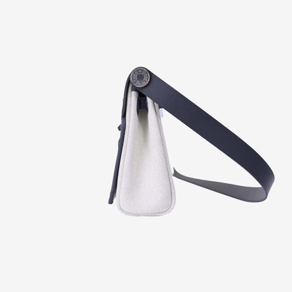 Hermès Herbag Mini in Grey Toile Canvas with Hunter Leather Trim with Palladium Hardware side view