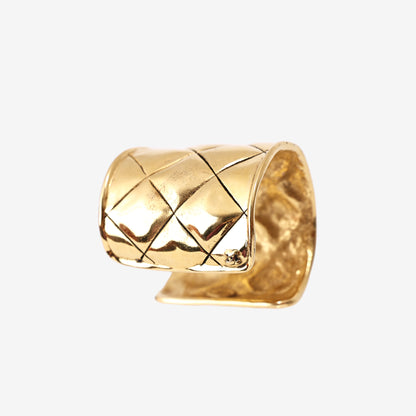 Chanel Vintage Quilted Cuff Bracelet in Gold-Tone Metal (Circa 1980) detail view