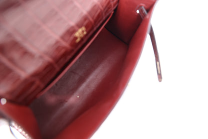 Hermès Kelly Pochette in Burgundy Matte Crocodile Leather with Gold-Plated Hardware