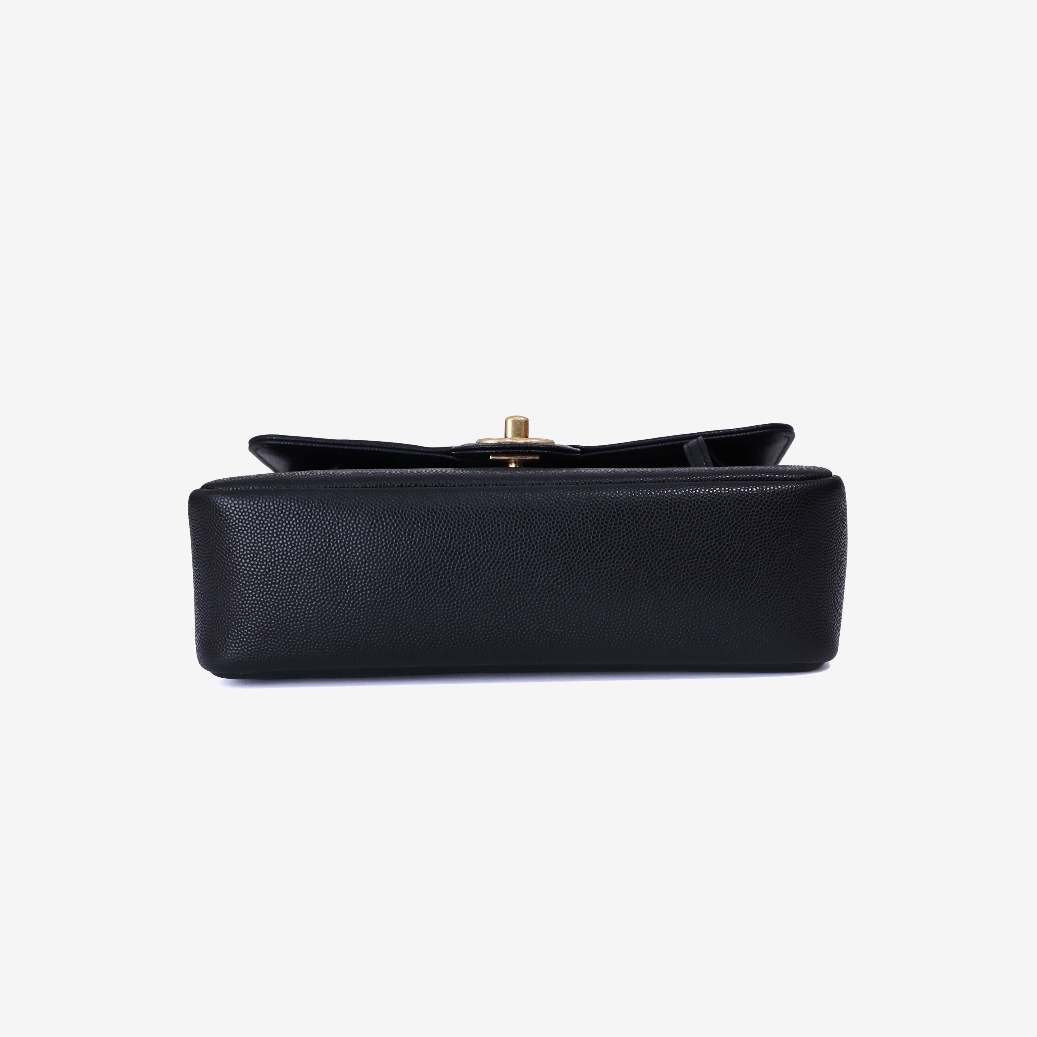 Chanel 26P Small Flap Bag in Black Calfskin with Gold Hardware bottom view