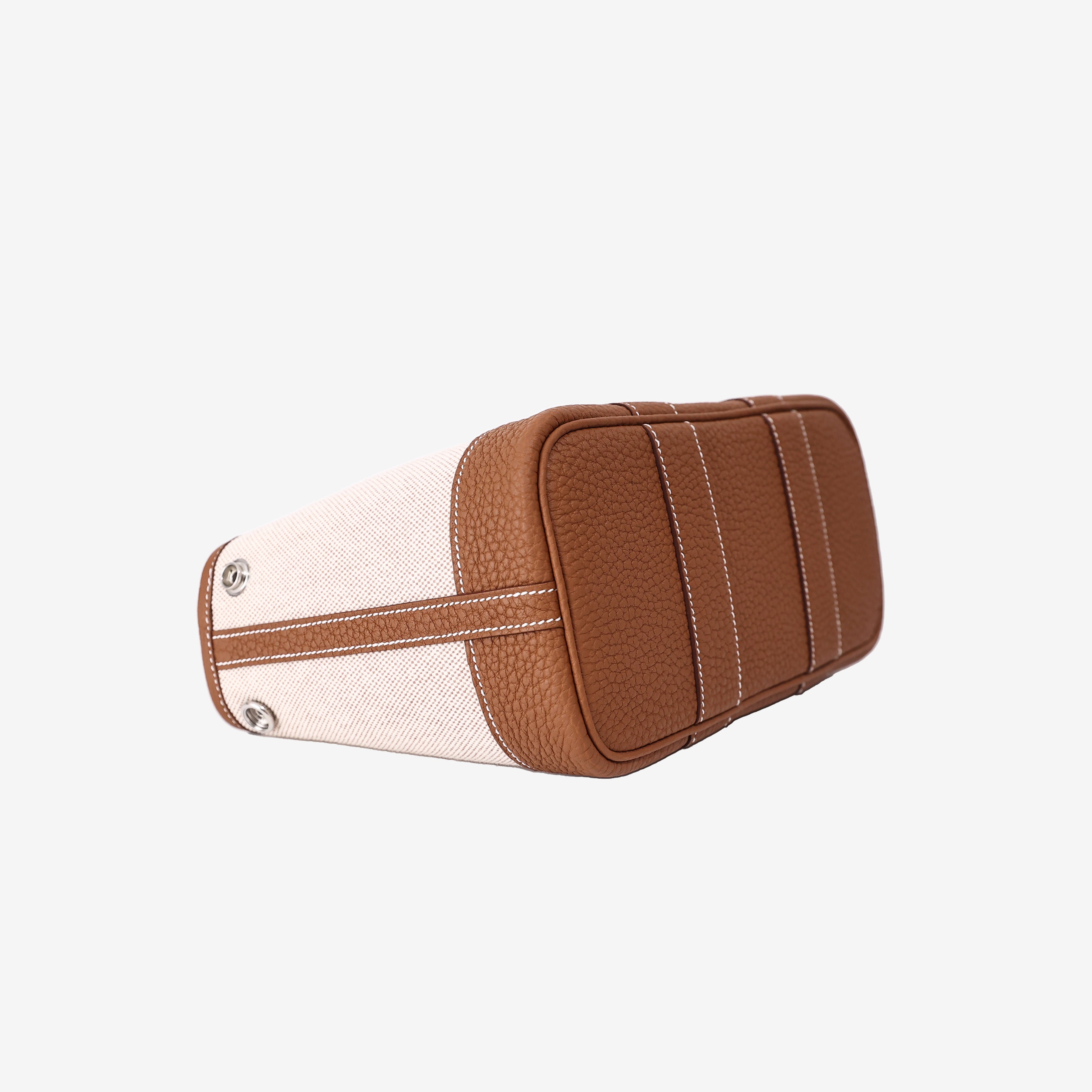 Hermès Neo Garden Party 23 Mini in Ecru, Beige and Ébène Negonda Leather and Canvas bottom side view