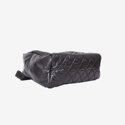 Chanel Coco Cocoon Quilted Backpack in Black Nylon with Palladium Hardware bottom side view