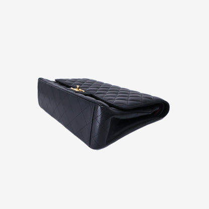 Chanel Maxi Classic Double Flap Bag in Black Caviar Leather with Gold Hardware