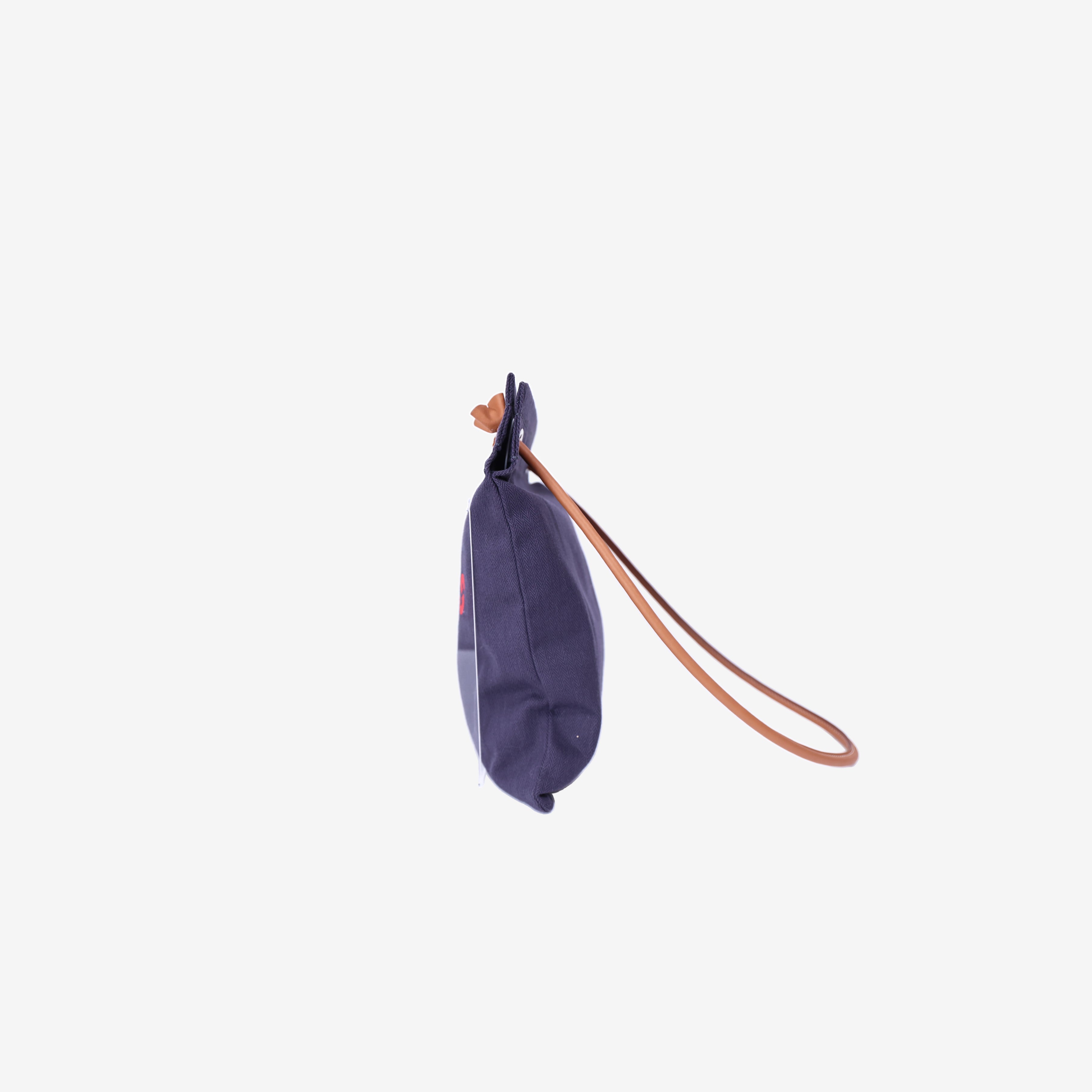 Hermès Alline Grooming Bag in Bleu Indigo/Gold Canvas Leather side view