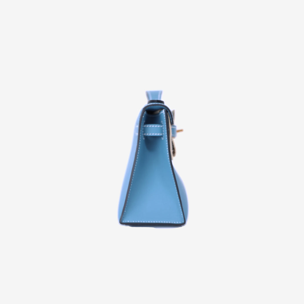 Hermès Kelly Pochette in Bleu Jean Swift Leather with Gold Hardware side view