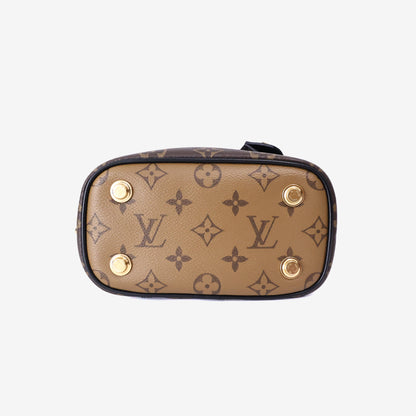 Louis Vuitton Vanity PM Handbag in Monogram/Reverse Monogram Coated Canvas with Gold Hardware