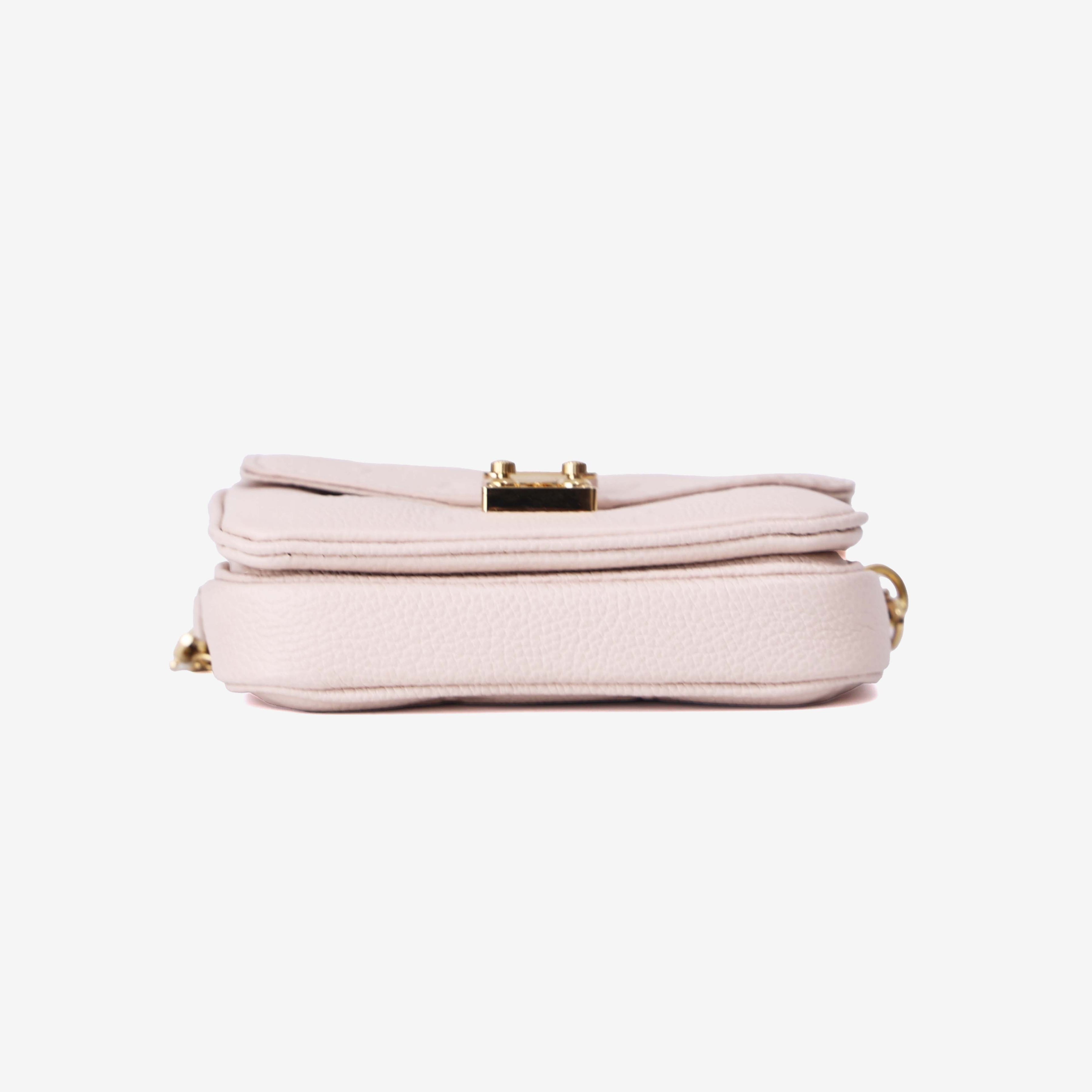 Louis Vuitton Micro Métis in Beige Calfskin Leather with Gold Hardware bottom view