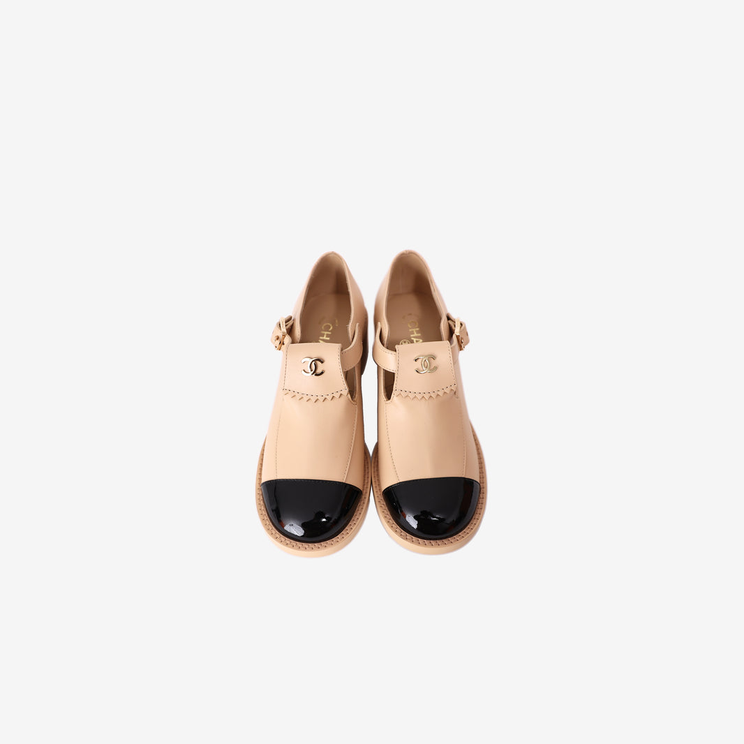 Chanel Mary Jane Flats in Beige Leather with Black Patent Cap-Toe (Size 38)
