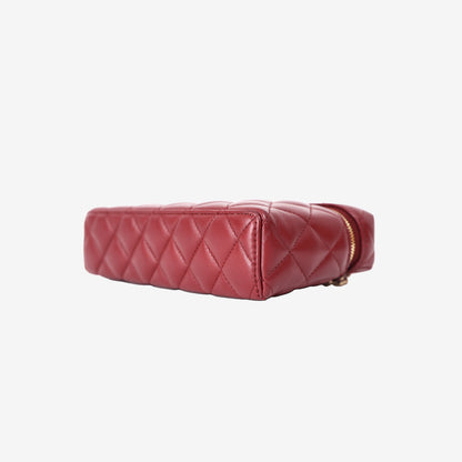 Chanel Vanity Bag with Top Handle in Burgundy Lambskin Leather with Gold Hardware bottom side view