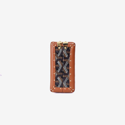 Goyard Minaudière Trunk Shoulder Bag in Black/Tan Goyardine Canvas with Clamecy Cowhide with Gold Hardware side view