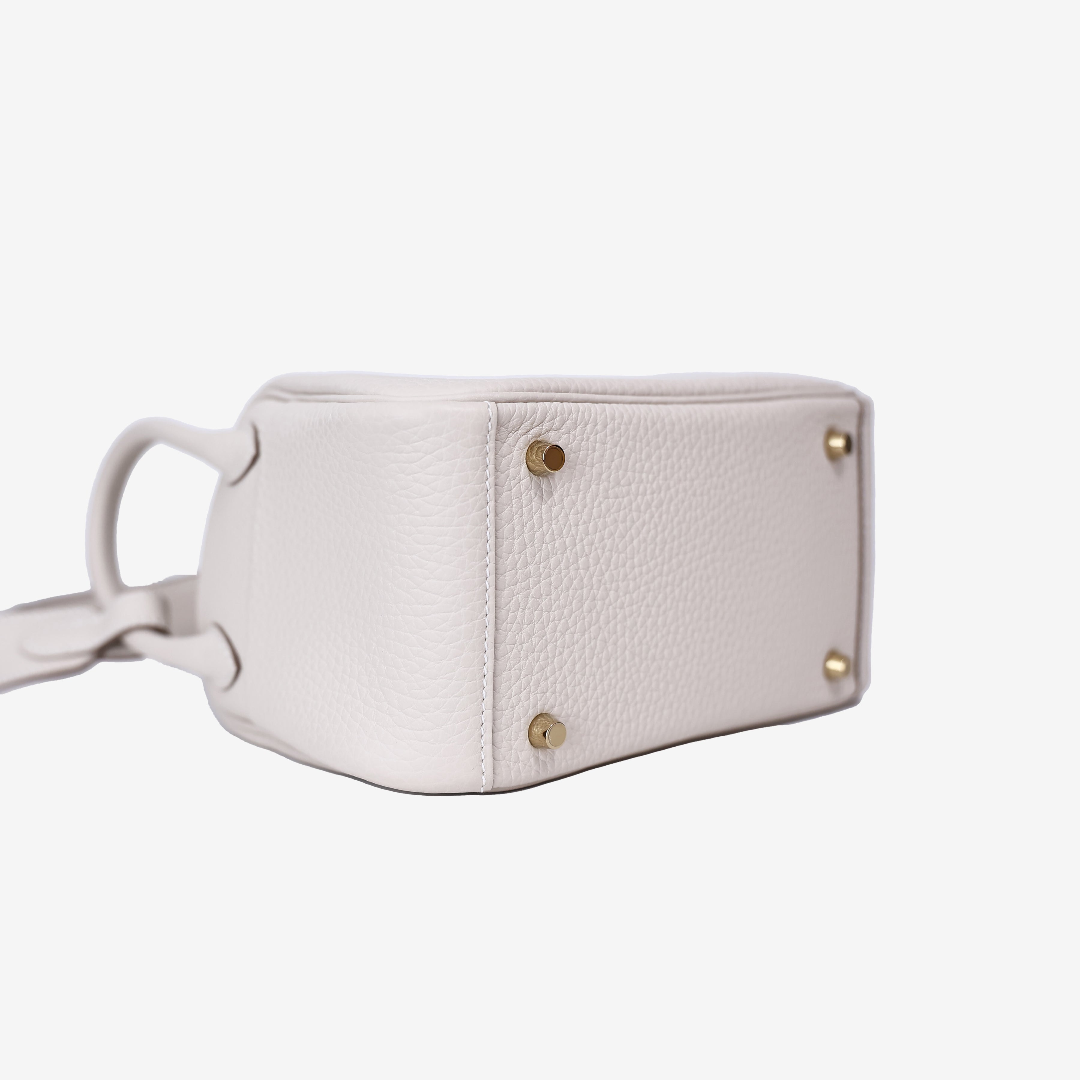 Hermès Mini Lindy in Craie Clemence Leather with Gold Hardware bottom side view