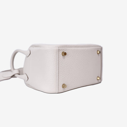Hermès Mini Lindy in Craie Clemence Leather with Gold Hardware bottom side view