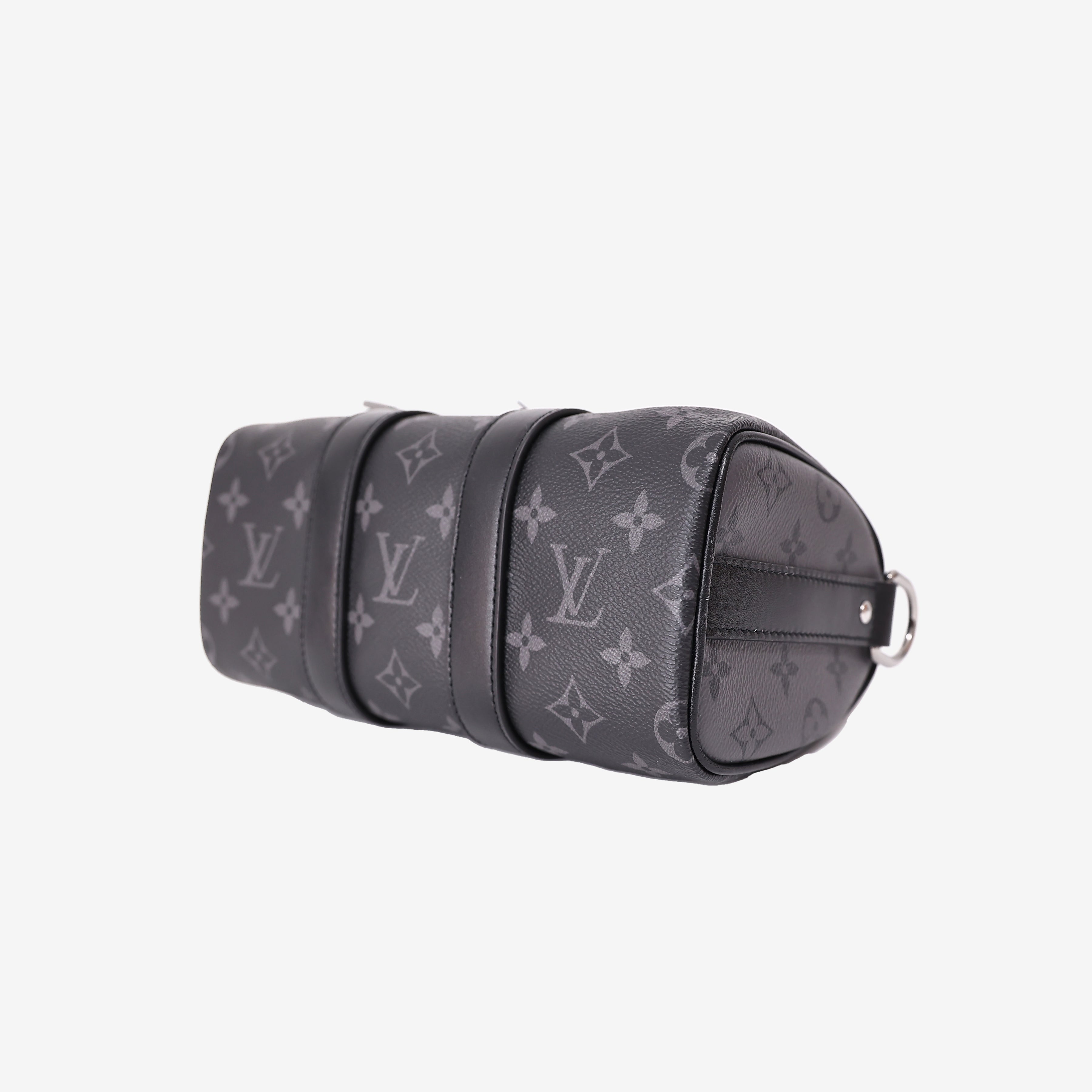 Louis Vuitton Keepall 25 in Monogram Eclipse Reverse Canvas with Black Leather Trim bottom side view
