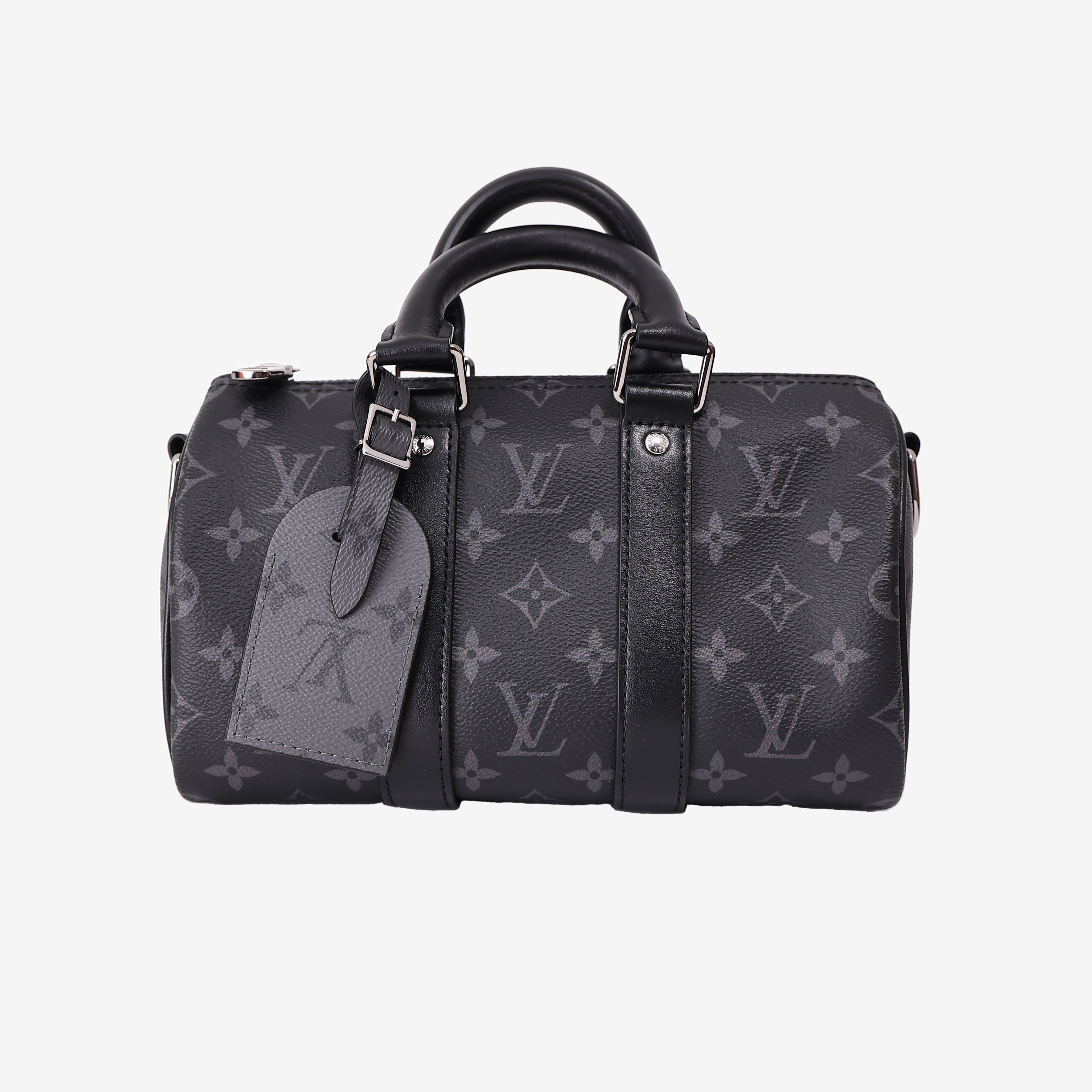 Louis Vuitton Keepall 25 in Monogram Eclipse Reverse Canvas with Black Leather Trim front view