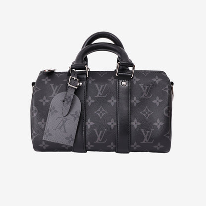 Louis Vuitton Keepall 25 in Monogram Eclipse Reverse Canvas with Black Leather Trim front view