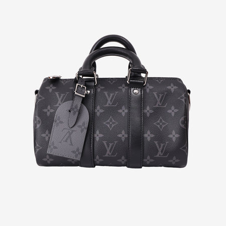 Louis Vuitton Keepall 25 in Monogram Eclipse Reverse Canvas with Black Leather Trim front view