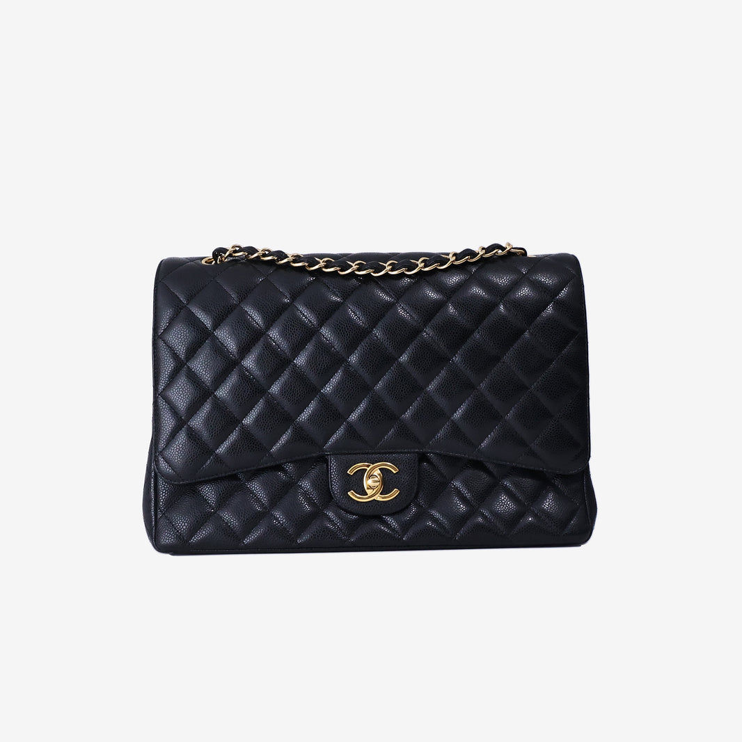 Chanel Maxi Classic Double Flap Bag in Black Caviar Leather with Gold Hardware