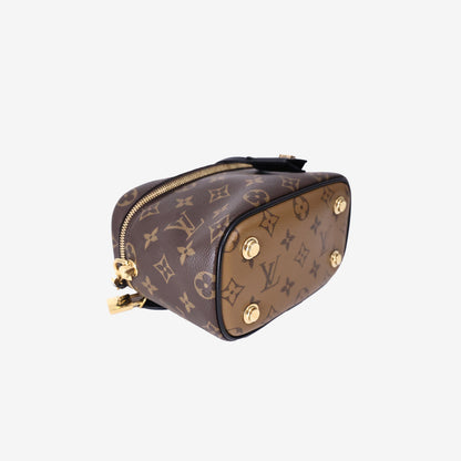 Louis Vuitton Vanity PM Handbag in Monogram/Reverse Monogram Coated Canvas with Gold Hardware