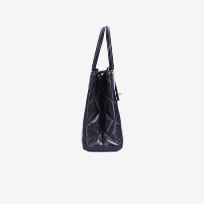 Chanel Kelly Nano Bag in Black Calfskin Leather with Gold Hardware side view