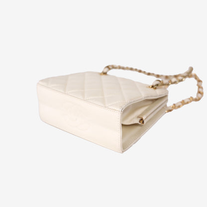 Chanel Quilted Clutch in Beige Satin with Gold Hardware