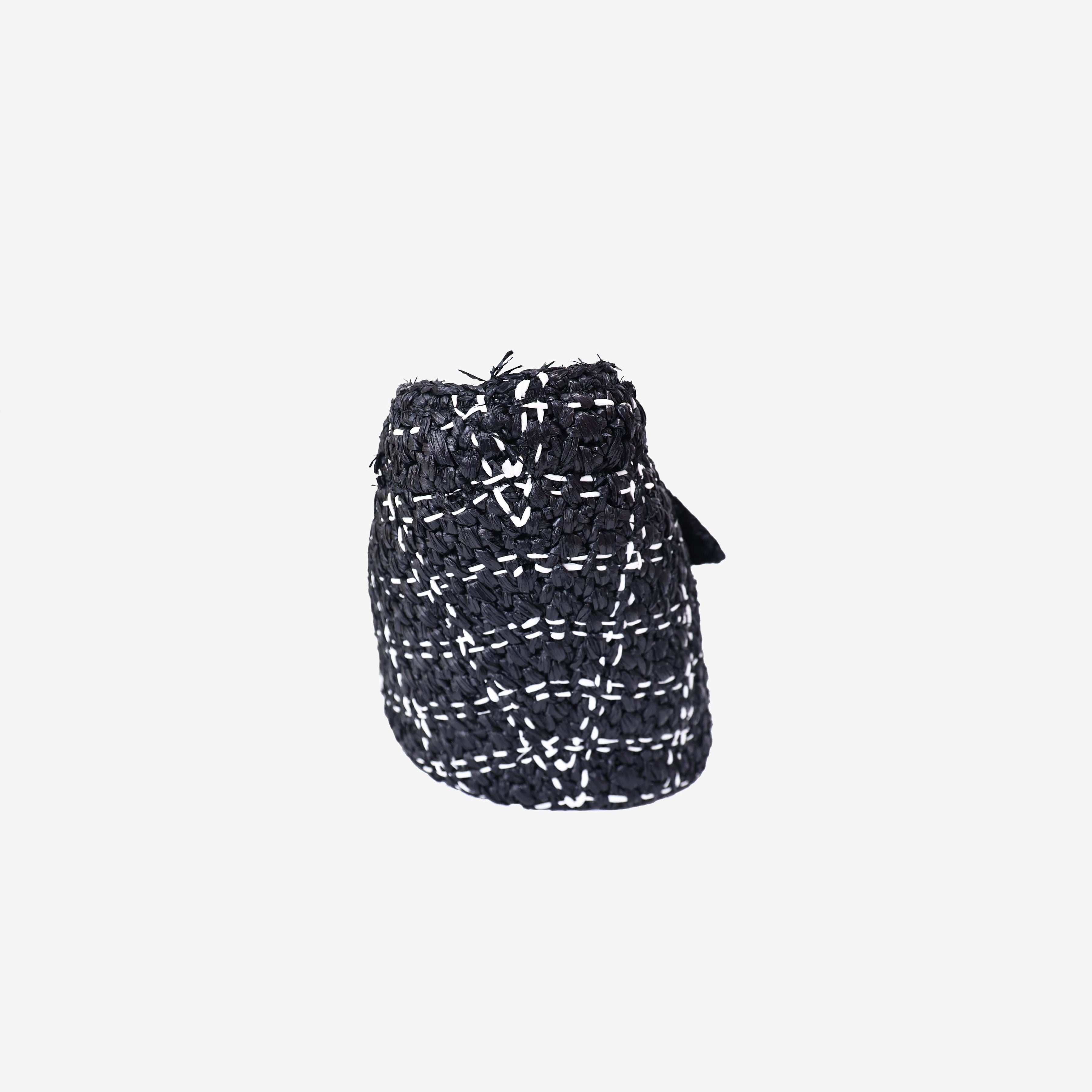 Chanel Raffia Effect Tote in Black/White Tweed Raffia Effect with Gold Hardware side view